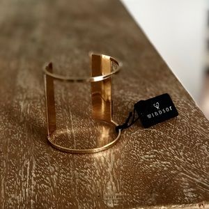 A Gold Adjustable Ringed Gladiator Bracelet